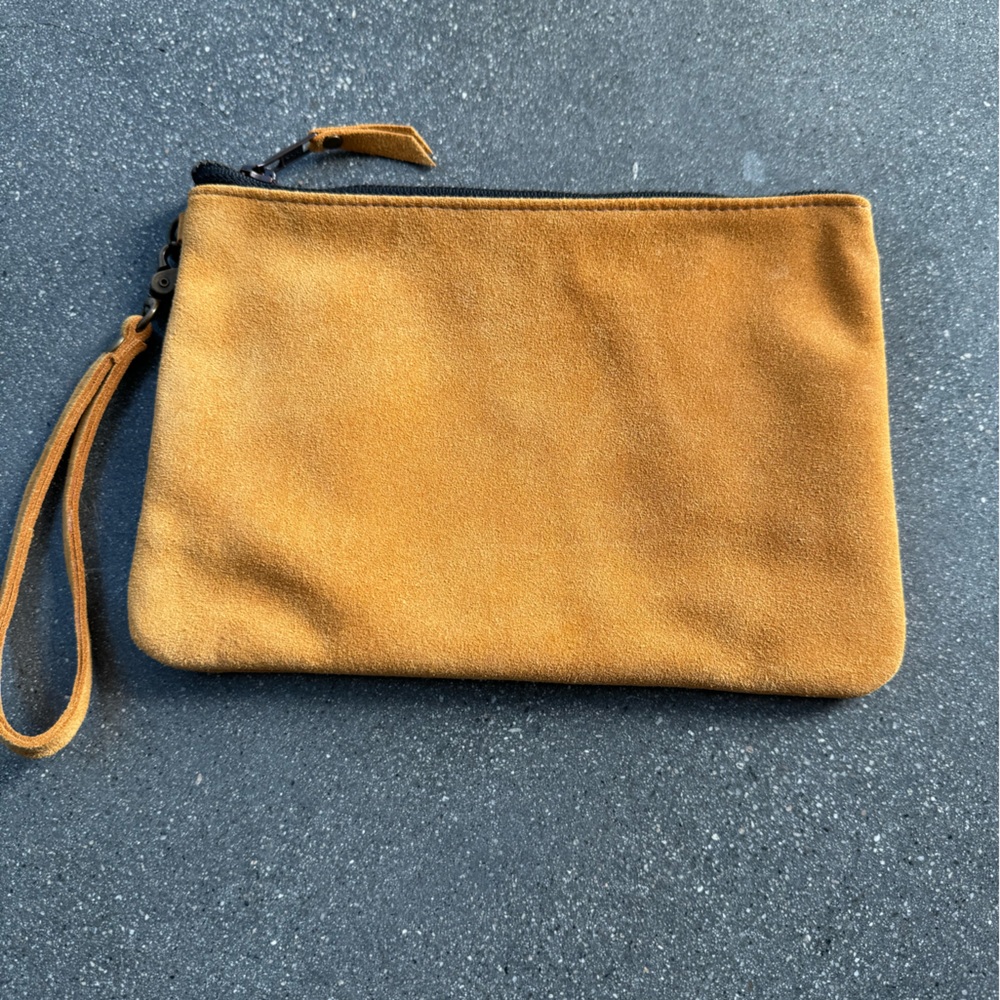 NWOT suede wristlet.
